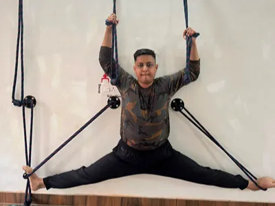 Warrior posture yoga class in Dehradun
