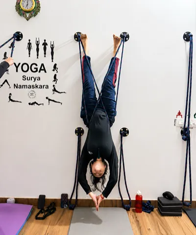 Standing yoga posture in a Dehradun class